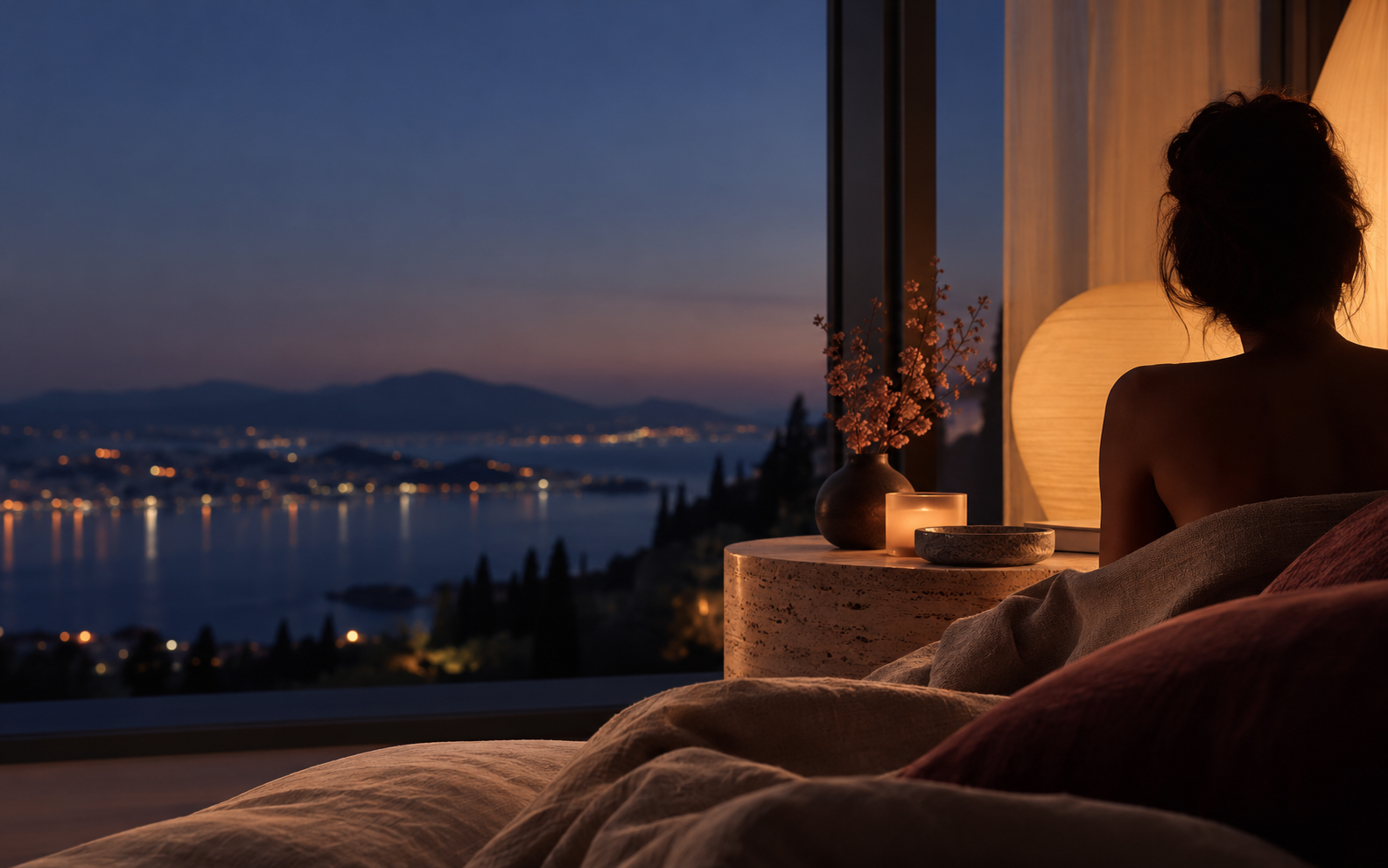 An anonymous silhouette resting beside a window at dusk